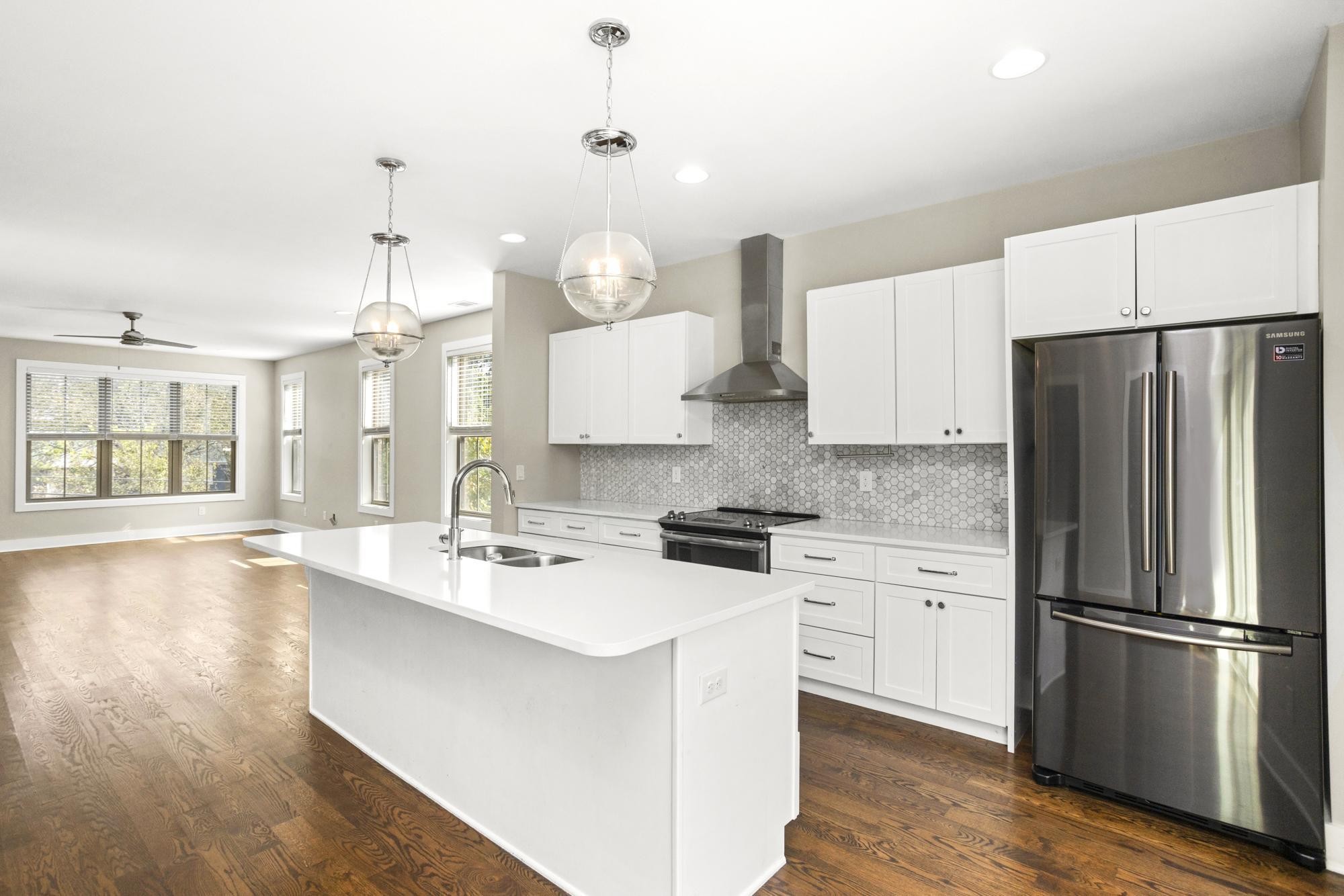 942 Riverside Drive Nashville, TN 37206 - Photo 7 of 33 a kitchen with stainless steel appliances a refrigerator sink and stove