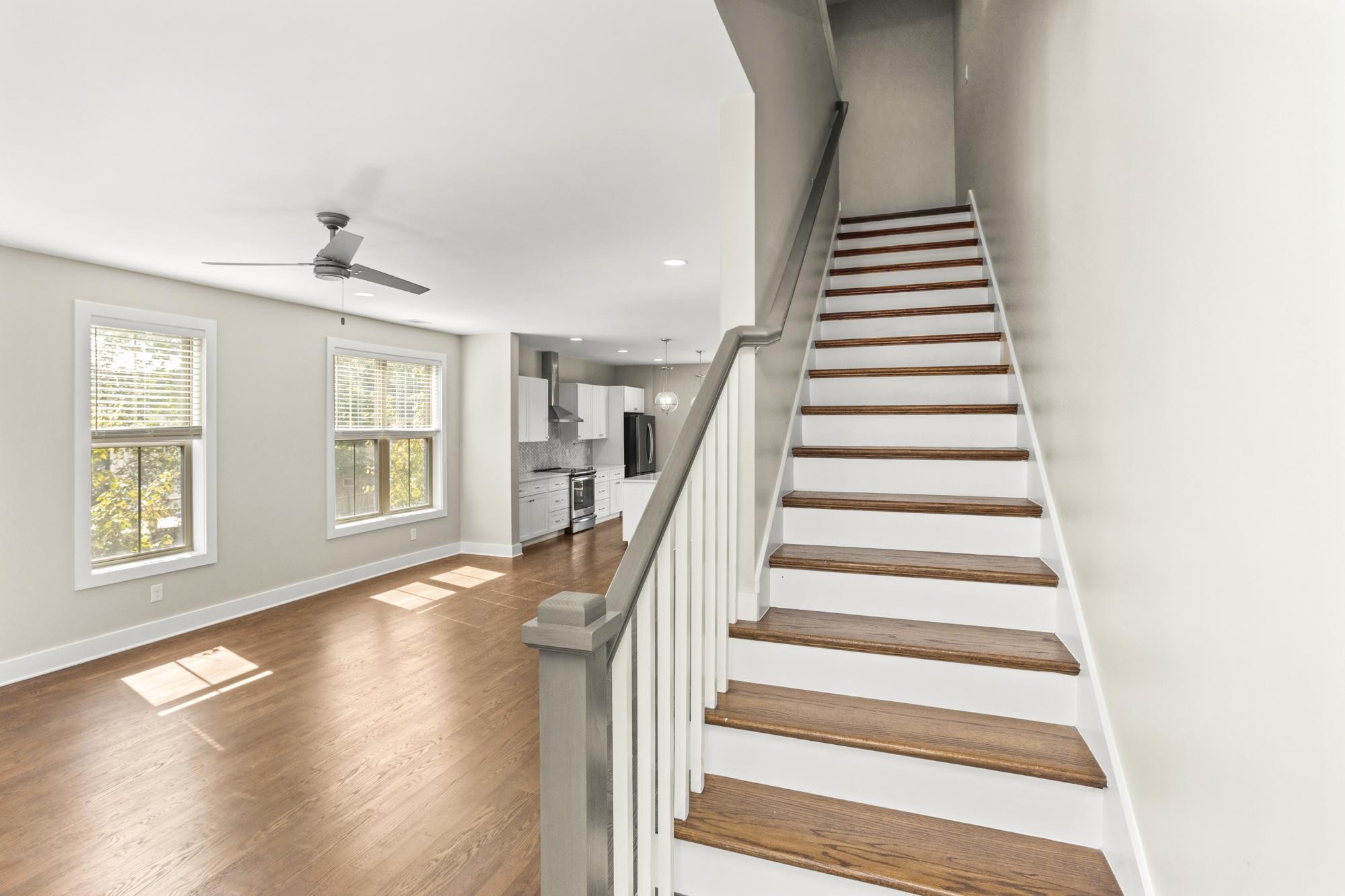 942 Riverside Drive Nashville, TN 37206 - Photo 10 of 33 a view of an entryway with wooden floor and stairs