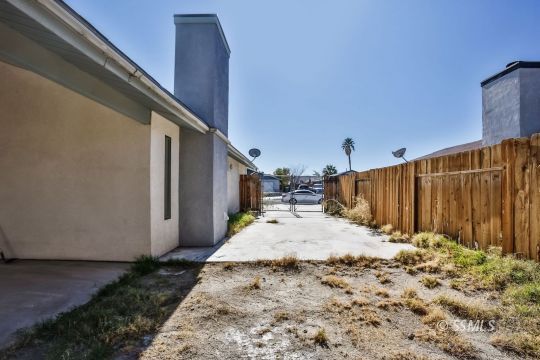 832 Walker Lane Ridgecrest, CA 93555 - Photo 20 of 23 a view of a backyard of the house
