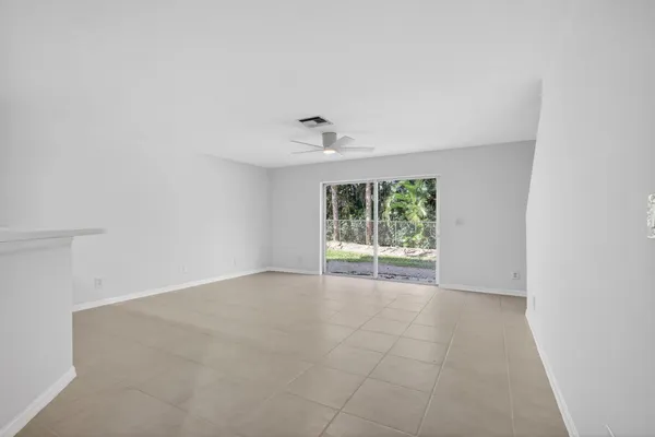 a view of a room with a flat screen tv