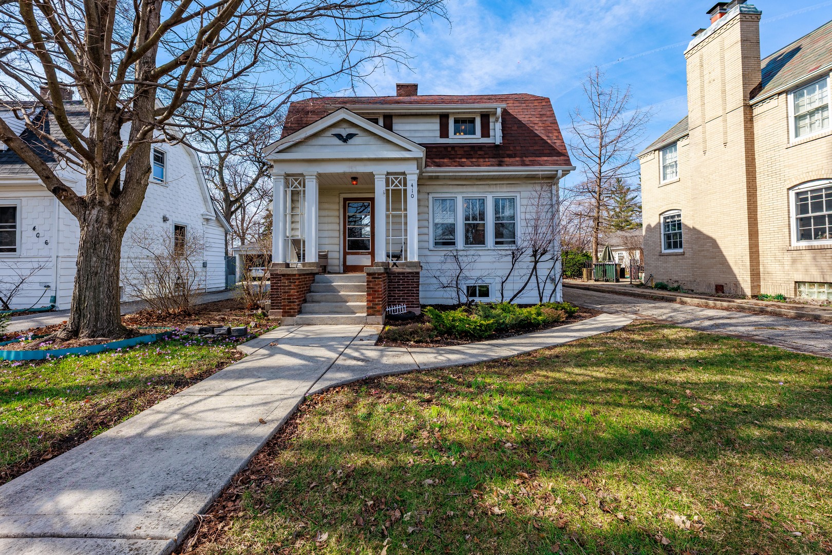 410 Repton Road Riverside, IL 60546 - Photo 2 of 30 a front view of a house with swimming pool