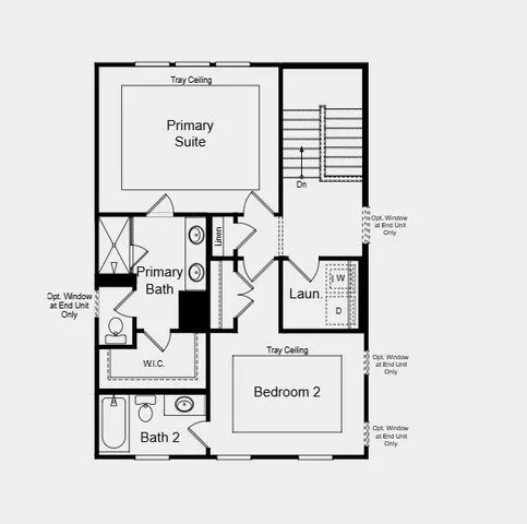 an aerial view of a house with a yard and lake view