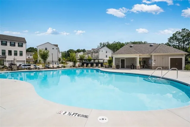 an aerial view of a swimming pool