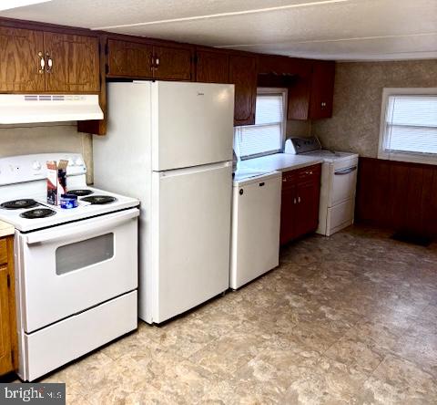 117 Sollenberger Road Chambersburg, PA 17202 - Photo 8 of 11 a kitchen with a stove sink and white refrigerator