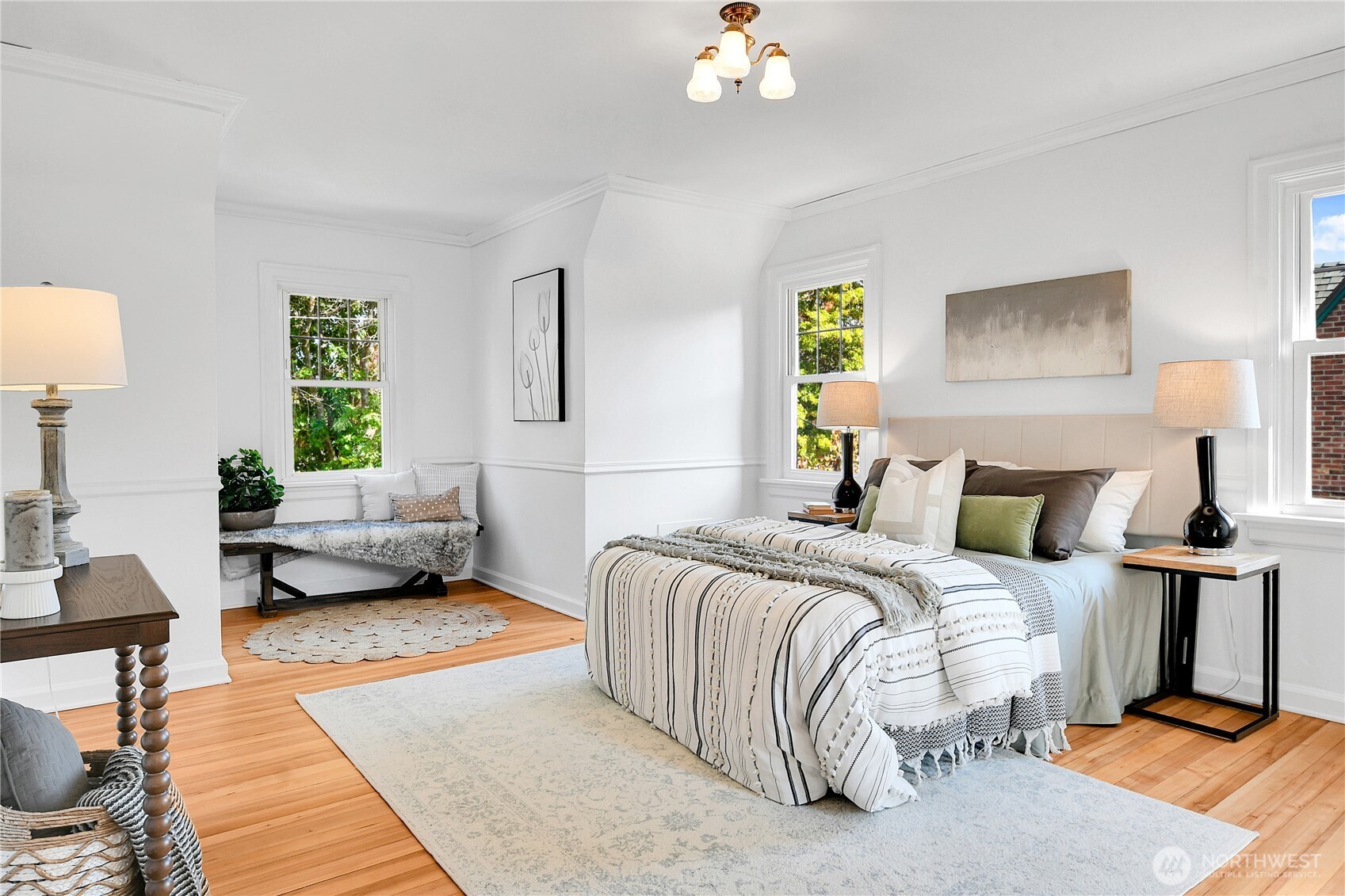107 West Blaine Street Seattle, WA 98119 - Photo 13 of 22 a bedroom with a bed and window