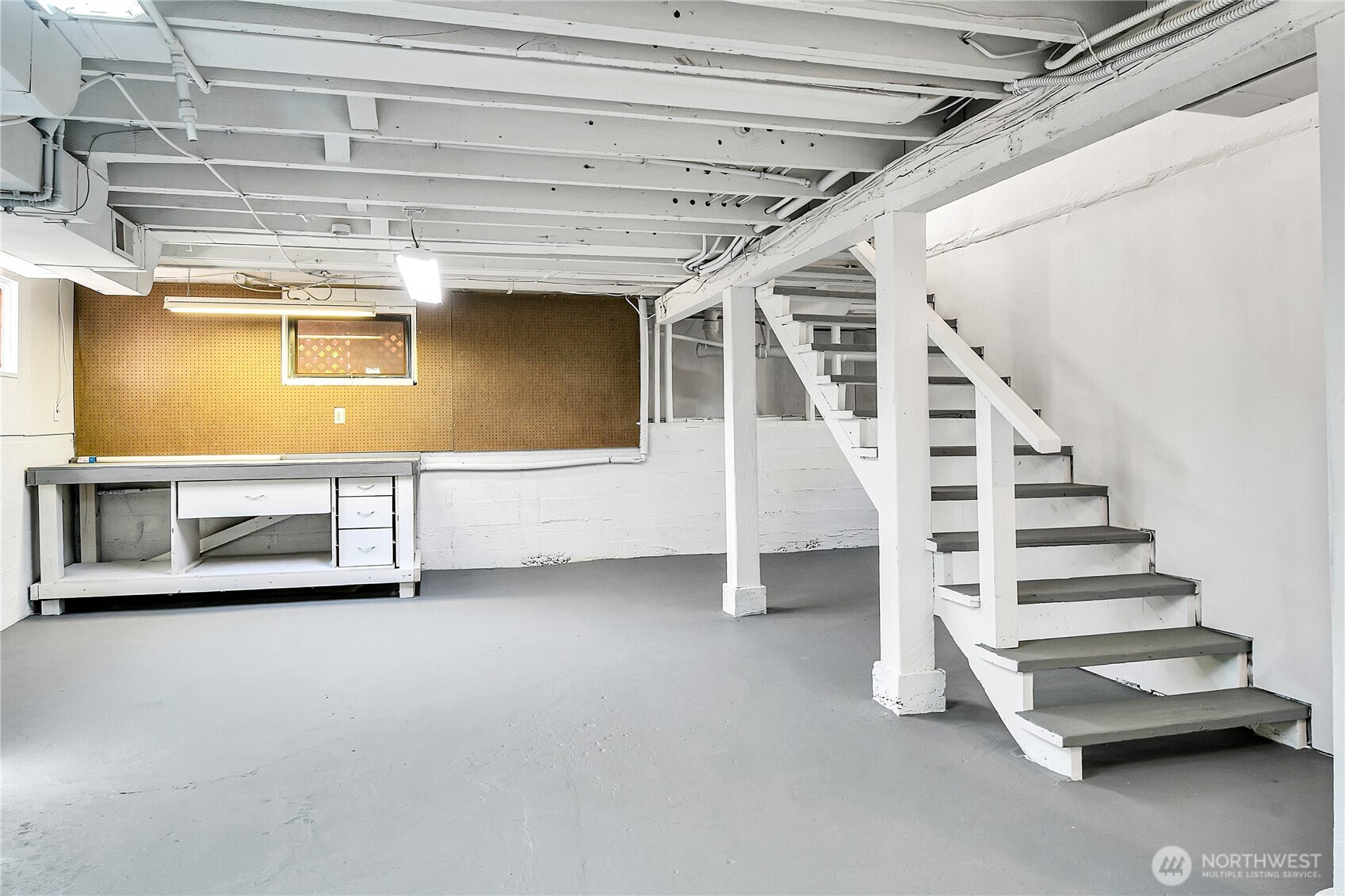 107 West Blaine Street Seattle, WA 98119 - Photo 16 of 22 a view of an empty room with stairs