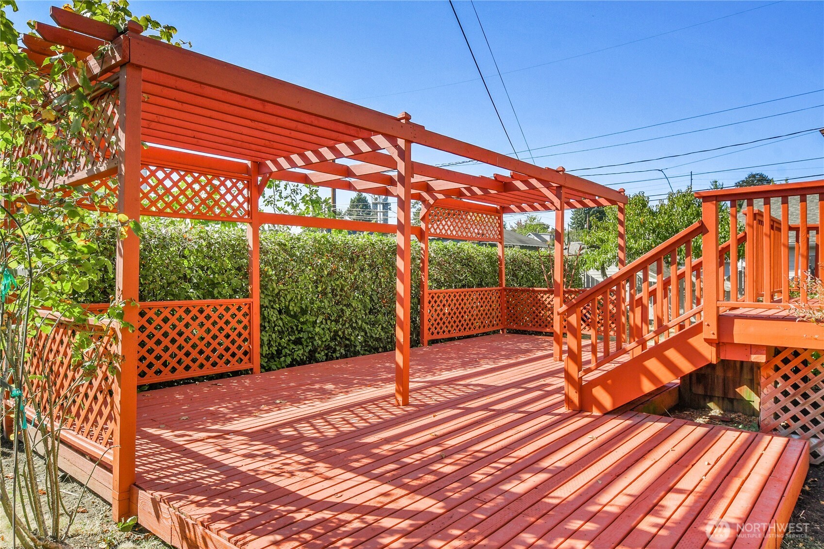 107 West Blaine Street Seattle, WA 98119 - Photo 19 of 22 a view of outdoor space with deck and wooden fence