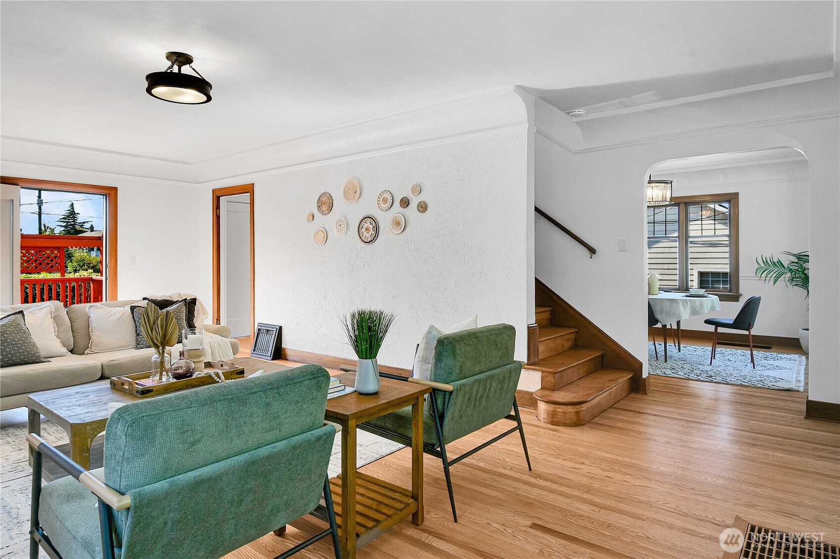 107 West Blaine Street Seattle, WA 98119 - Photo 4 of 22 a living room with furniture and a wooden floor