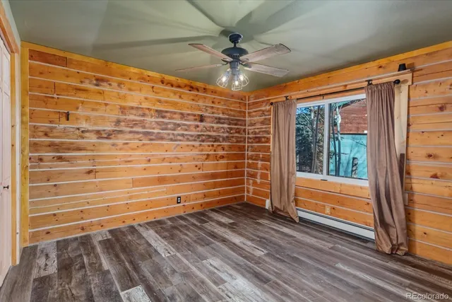 a view of entryway with wooden floor