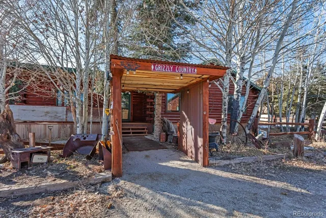 an aerial view of a house with a lake view