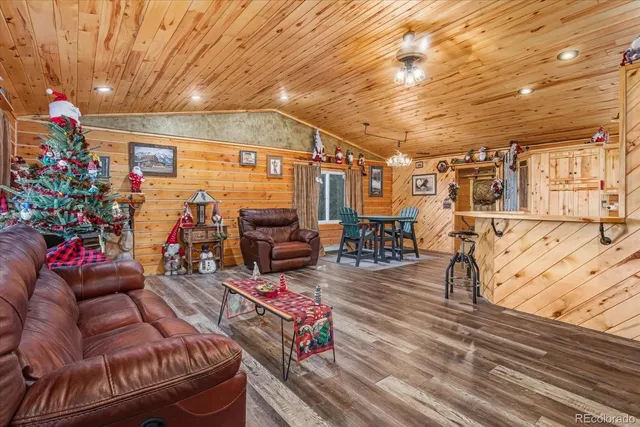 a building outdoor space with patio furniture and potted plants