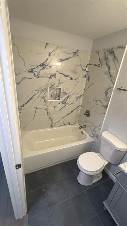 836 Southwest 64th Terrace, Unit A Gainesville, FL 32607 - Photo 6 of 13 a bathroom with a sink and a toilet