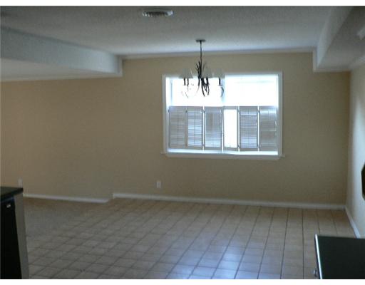 4129 Montego Drive Corpus Christi, TX 78411 - Photo 3 of 7 a view of an empty room with wooden floor and a window