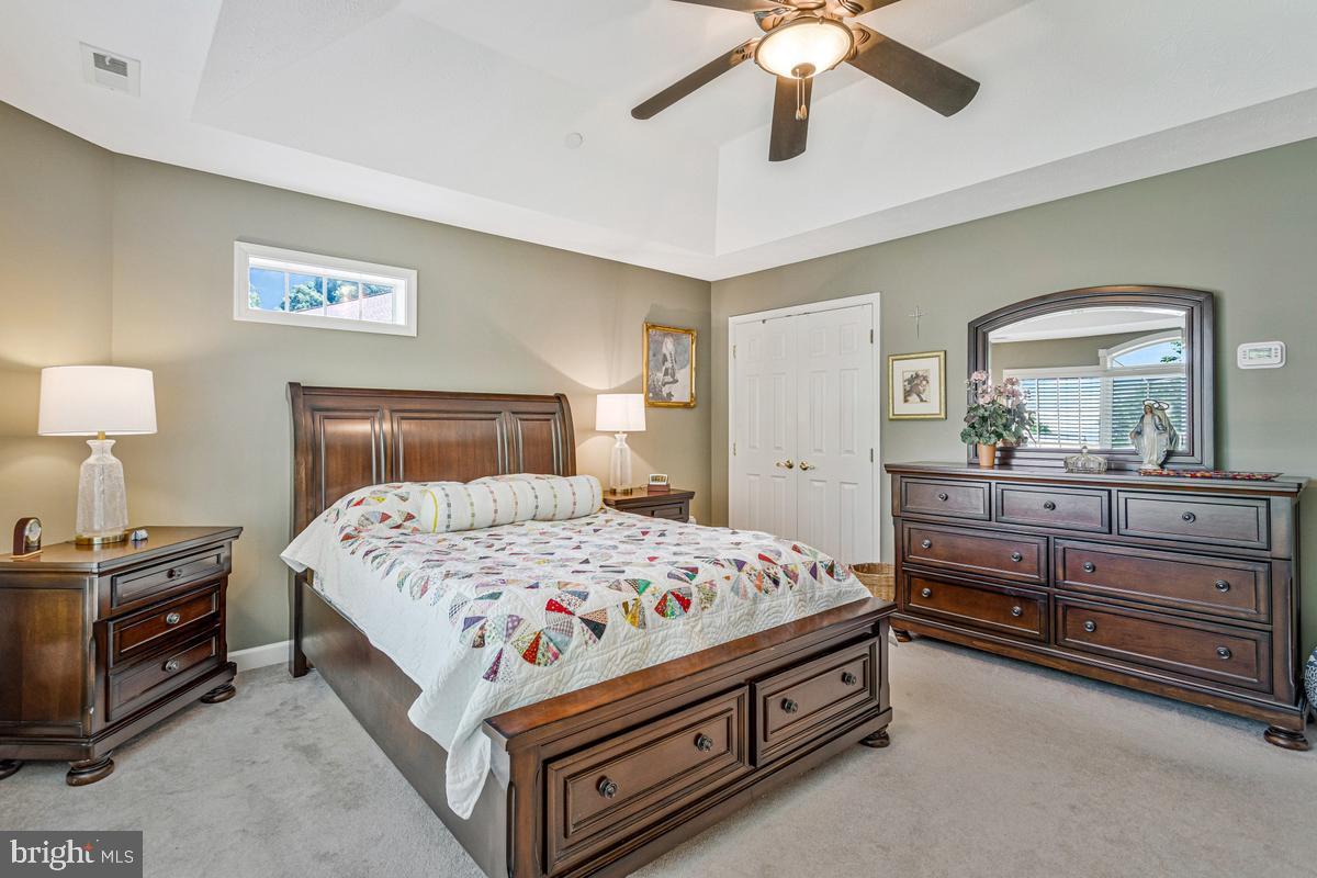 11565 Magnolia Court Issue, MD 20645 - Photo 28 of 68 a bedroom with a bed and a dresser in it