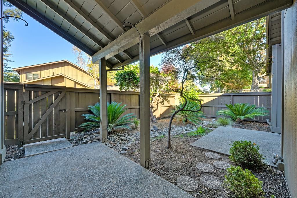 224 East Ranch Road Sacramento, CA 95825 - Photo 12 of 65 a view of backyard with plants and outdoor seating