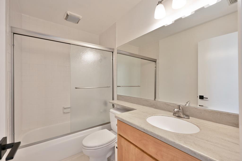 224 East Ranch Road Sacramento, CA 95825 - Photo 26 of 65 a bathroom with a granite countertop sink toilet and shower