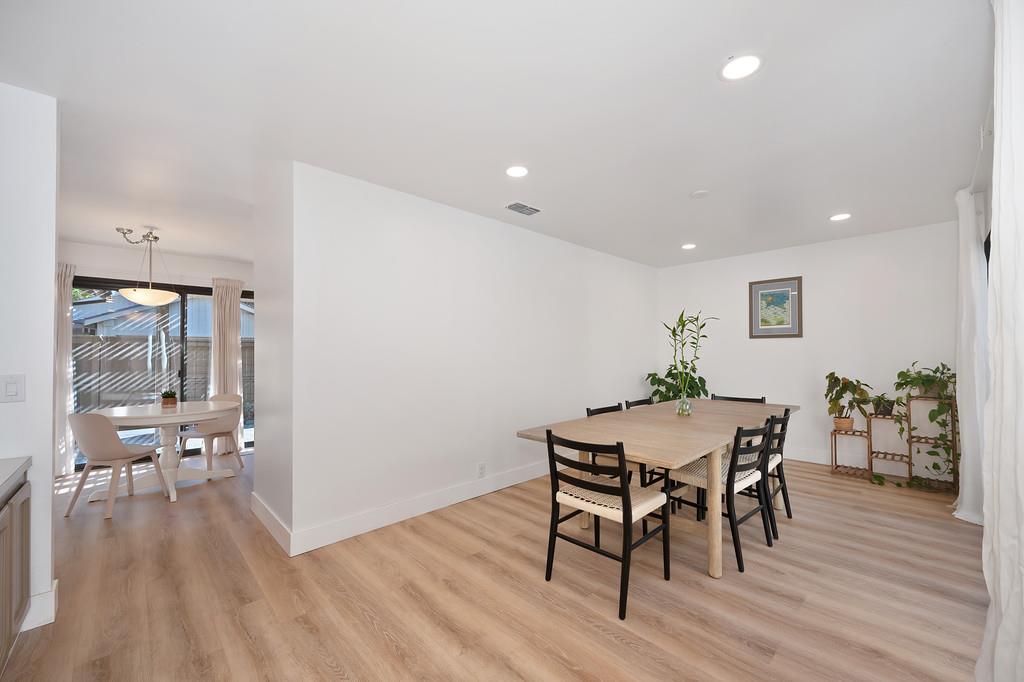 224 East Ranch Road Sacramento, CA 95825 - Photo 30 of 65 a view of a dining room with furniture and wooden floor