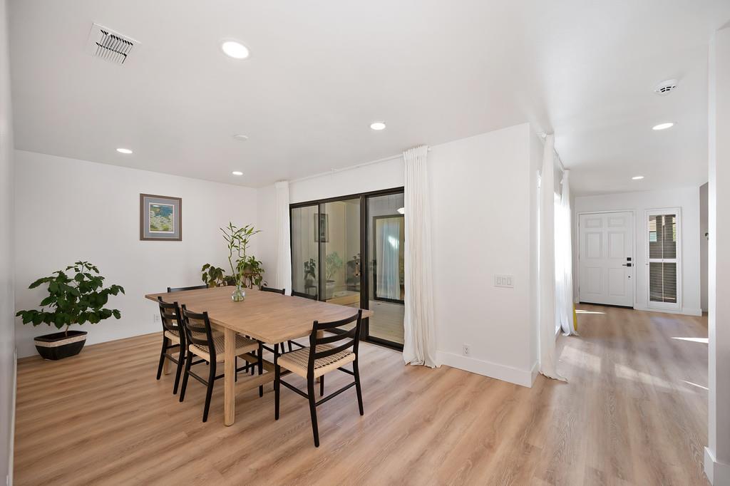 224 East Ranch Road Sacramento, CA 95825 - Photo 31 of 65 a view of a dining room with furniture and wooden floor
