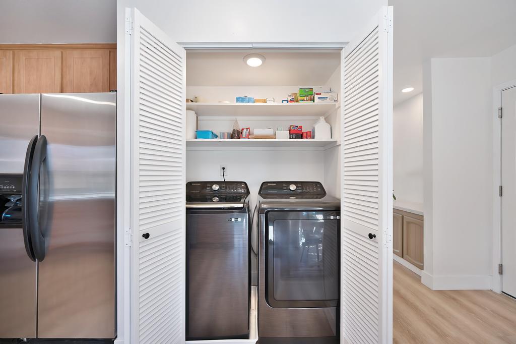 224 East Ranch Road Sacramento, CA 95825 - Photo 34 of 65 a kitchen with refrigerator and window