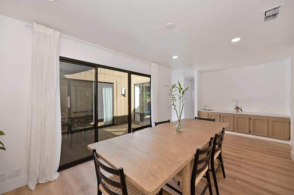 224 East Ranch Road Sacramento, CA 95825 - Photo 4 of 65 a view of a dining room with furniture and wooden floor