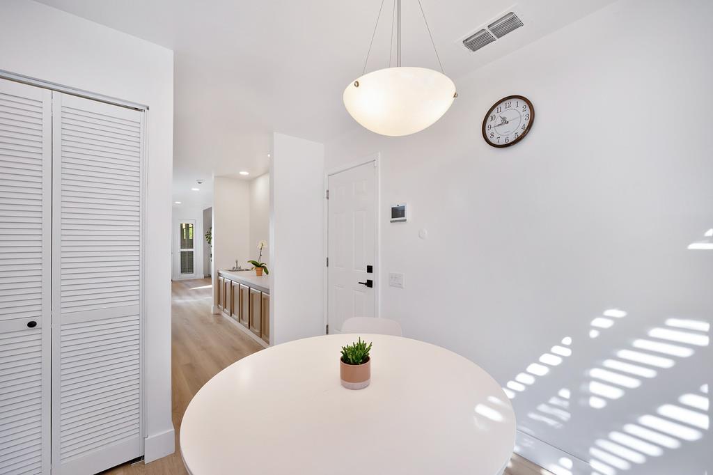 224 East Ranch Road Sacramento, CA 95825 - Photo 43 of 65 a view of a dining room with furniture and wooden floor