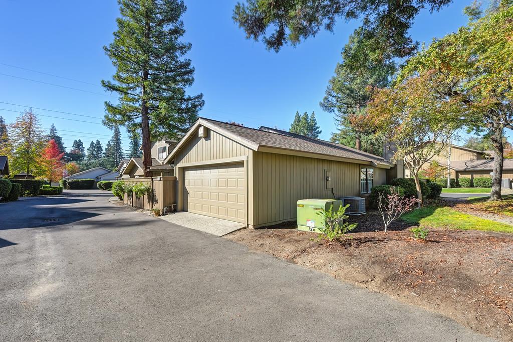 224 East Ranch Road Sacramento, CA 95825 - Photo 56 of 65 a view of patio with a table and chairs under an umbrella