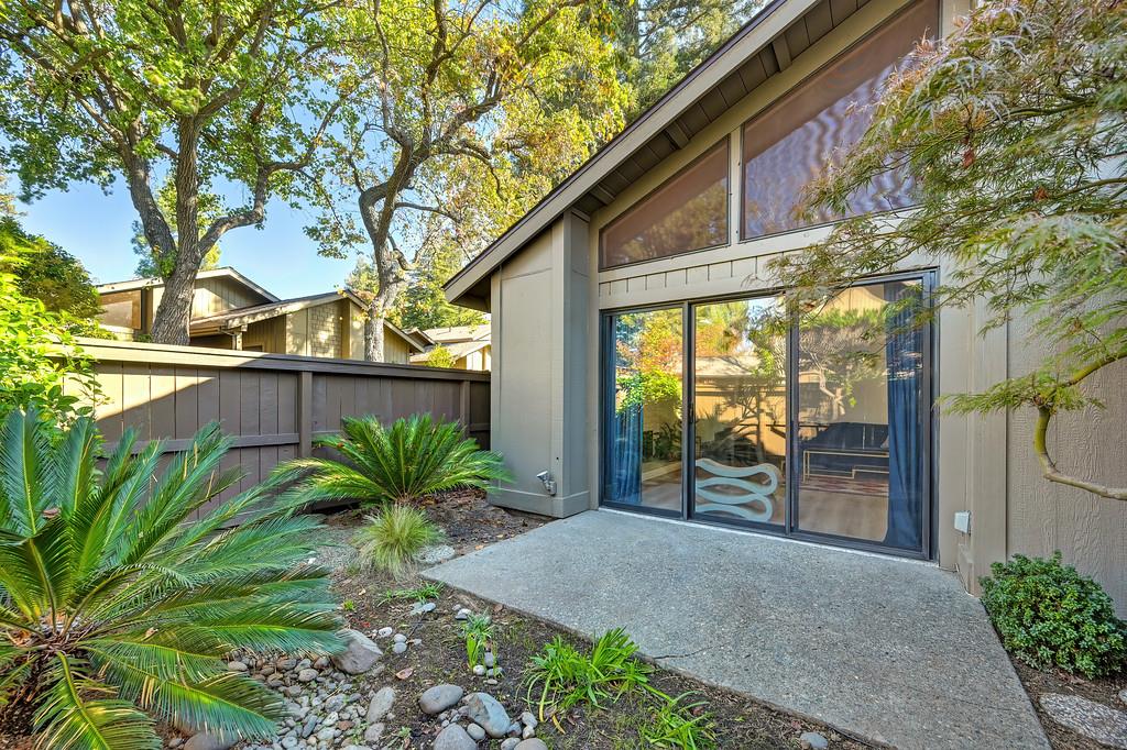 224 East Ranch Road Sacramento, CA 95825 - Photo 9 of 65 a view of a house with a large window and plants