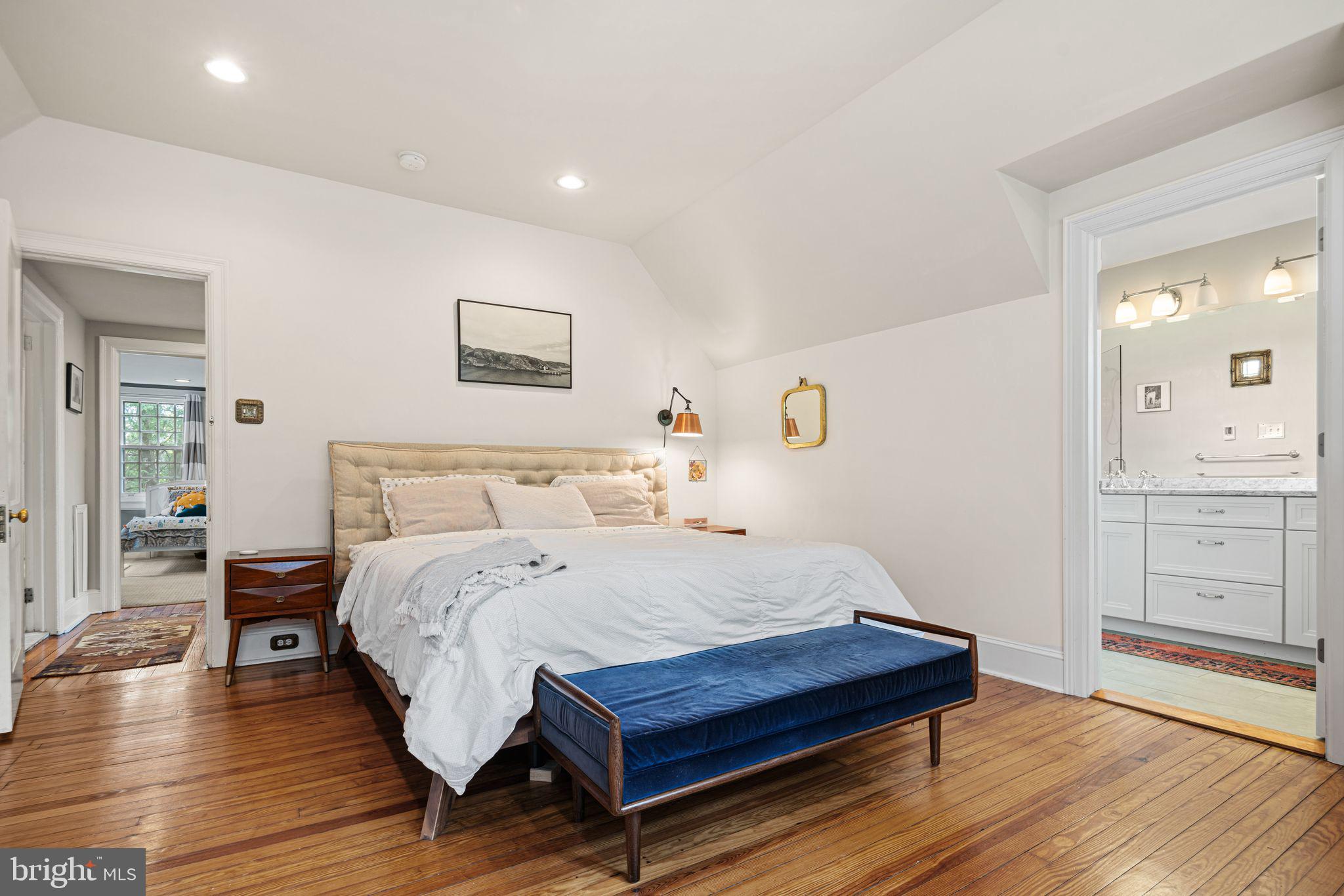 721 Rugby Road Bryn Mawr, PA 19010 - Photo 17 of 38 a bedroom with a bed and wooden floor