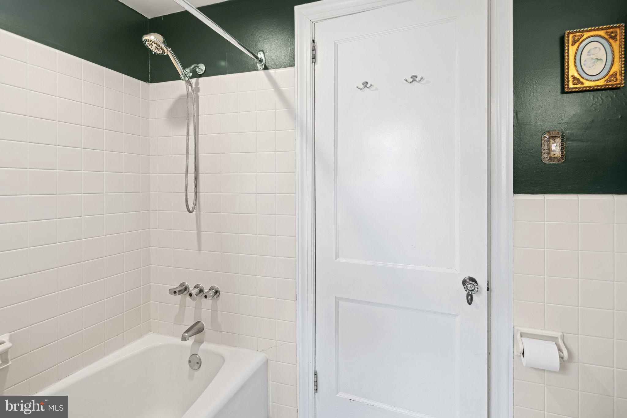 721 Rugby Road Bryn Mawr, PA 19010 - Photo 22 of 38 a bathroom with a bathtub and shower