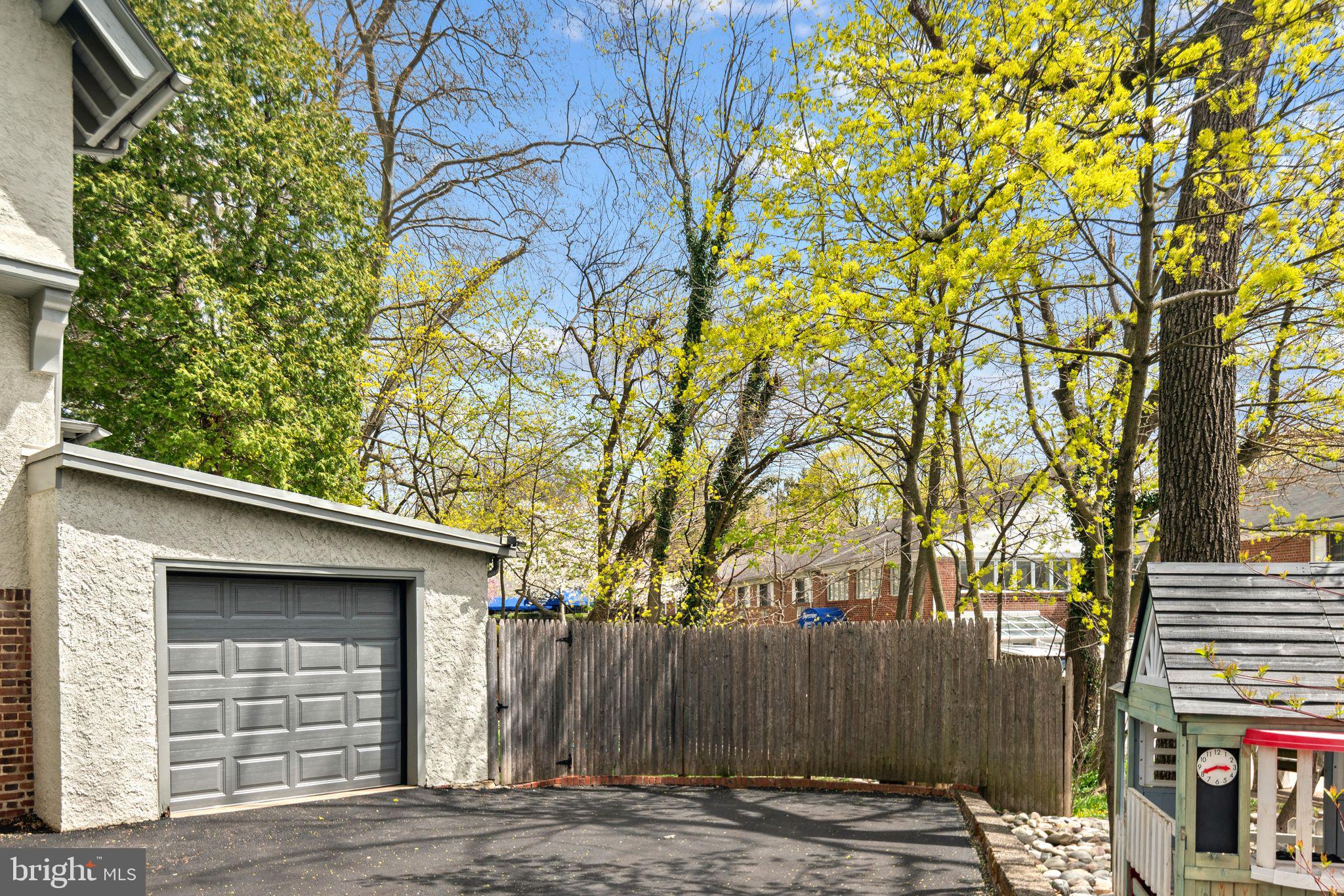 721 Rugby Road Bryn Mawr, PA 19010 - Photo 36 of 38 a side view of a house with a tree