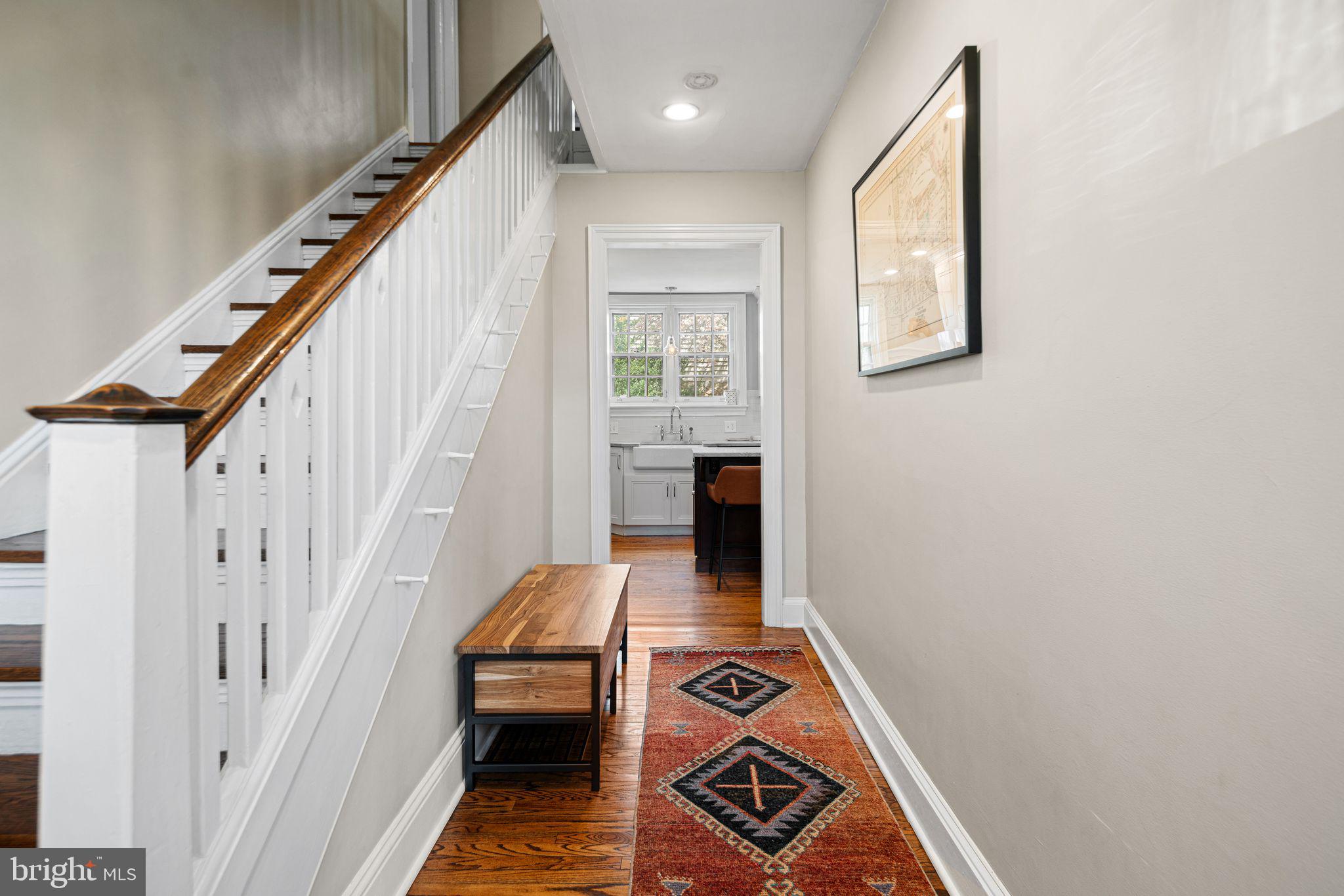 721 Rugby Road Bryn Mawr, PA 19010 - Photo 4 of 38 a room with wooden floor and white walls