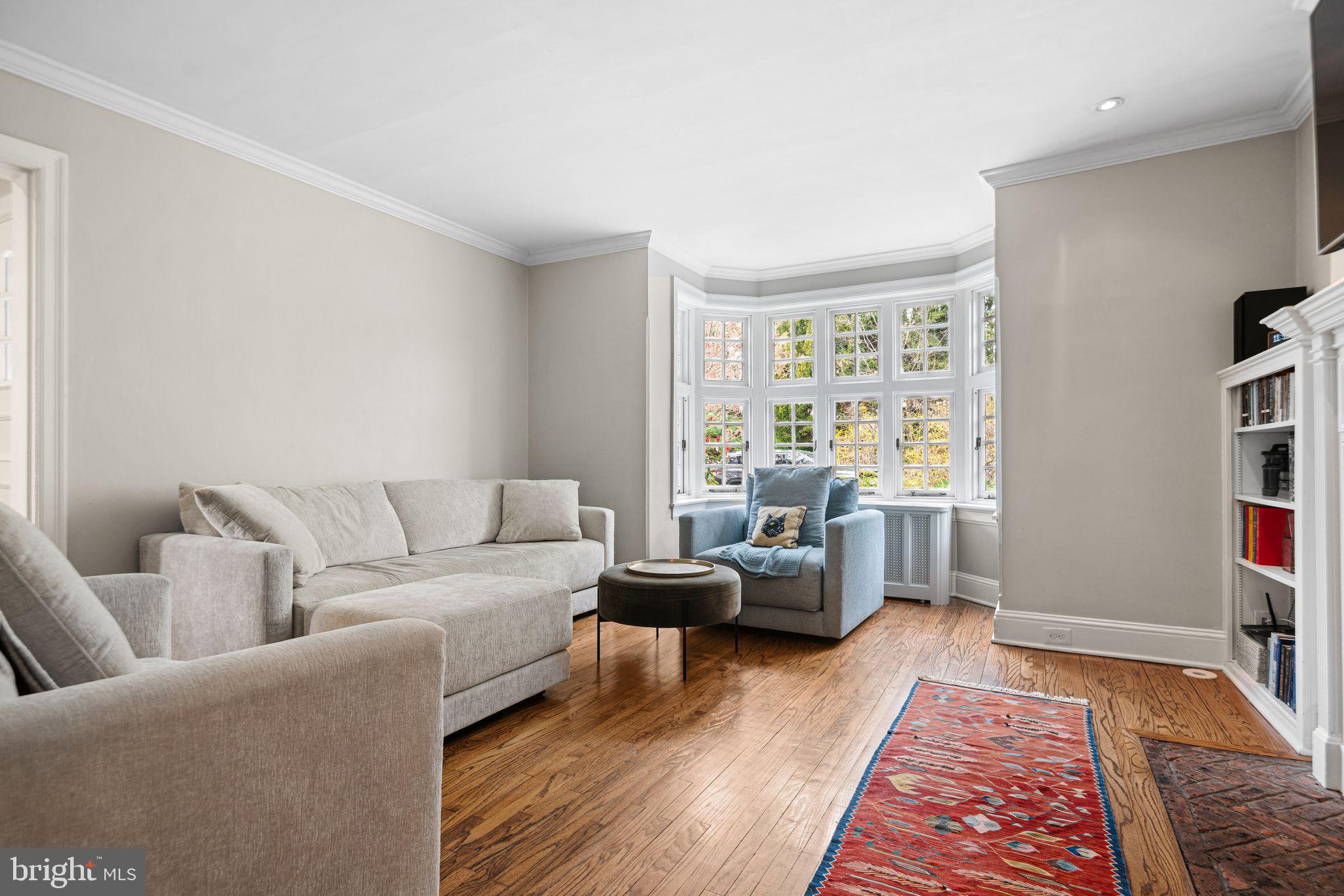 721 Rugby Road Bryn Mawr, PA 19010 - Photo 6 of 38 a living room with furniture and a rug