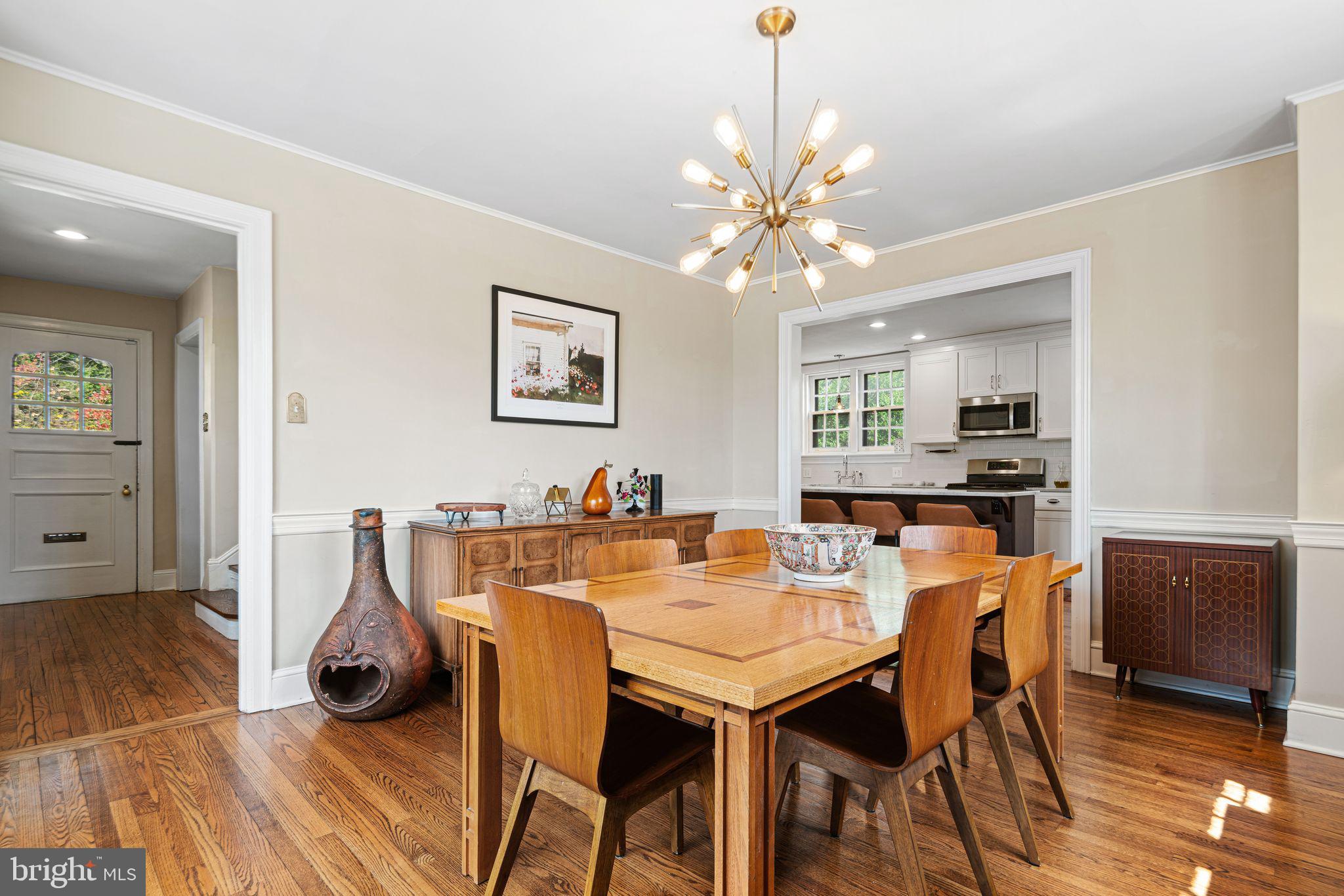 721 Rugby Road Bryn Mawr, PA 19010 - Photo 8 of 38 a view of a dining room with furniture and wooden floor