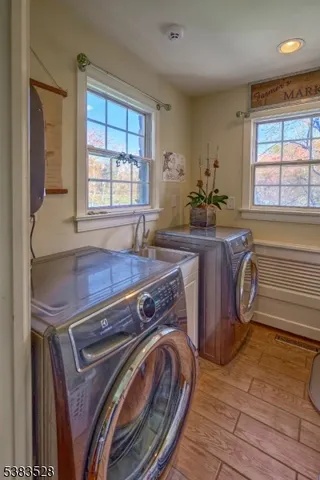 a view of a kitchen with furniture and a window