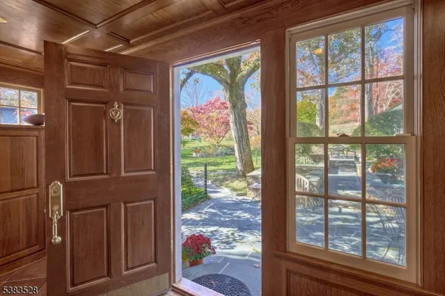 a view of a pathway with a tree