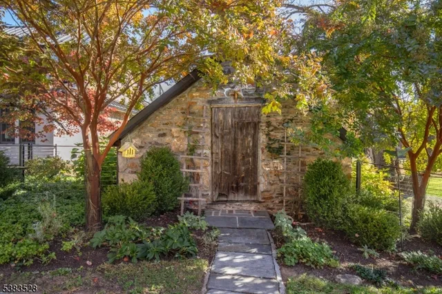 a house view with a garden space