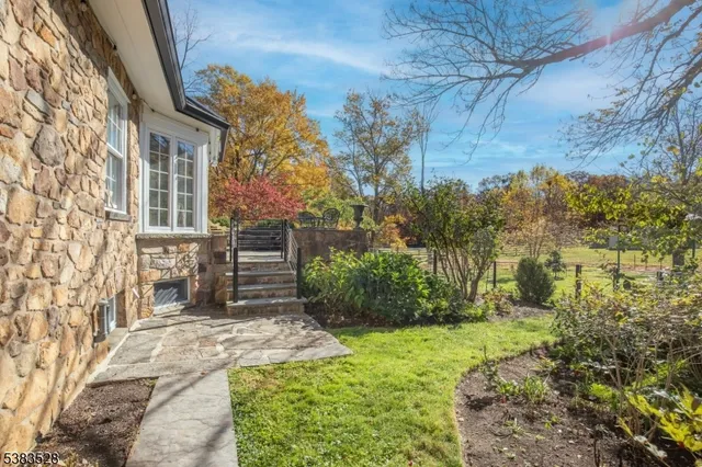 a view of a chairs and table in a patio