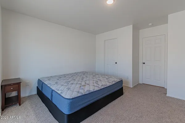 a living room with a couch and a table