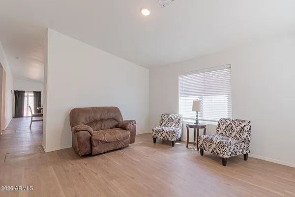 a living room with furniture and a couch