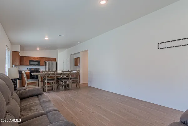 a view of a livingroom with furniture and window