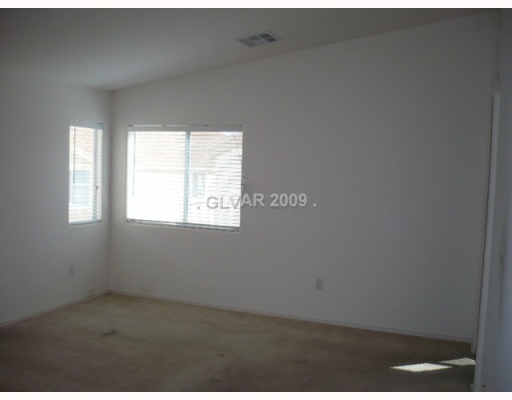 8839 Roping Rodeo Avenue, Unit 103 Las Vegas, NV 89178 - Photo 4 of 10 Master Bedroom.