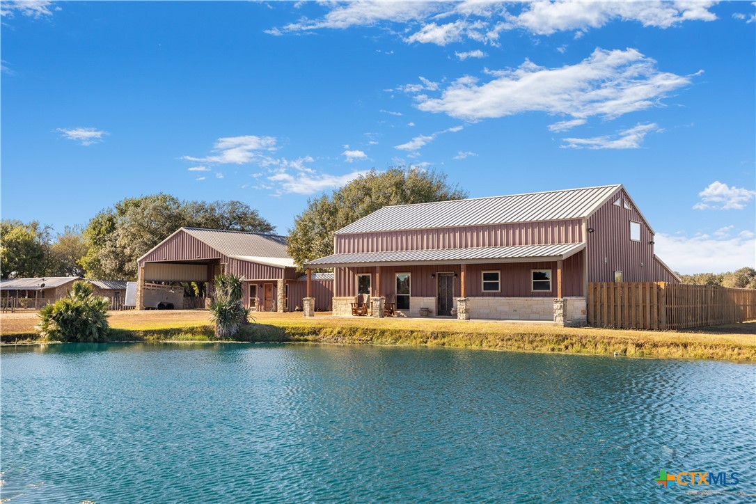 a view of a house with a big yard