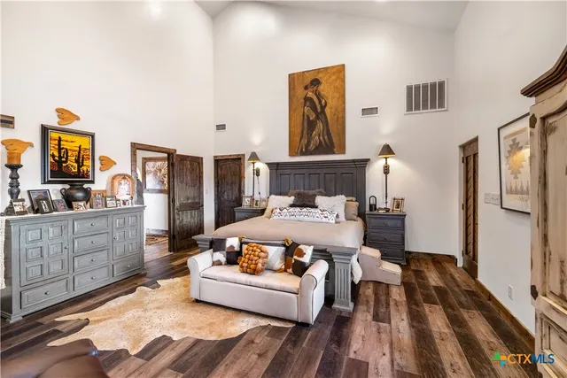 a bed room with a bed and a couch