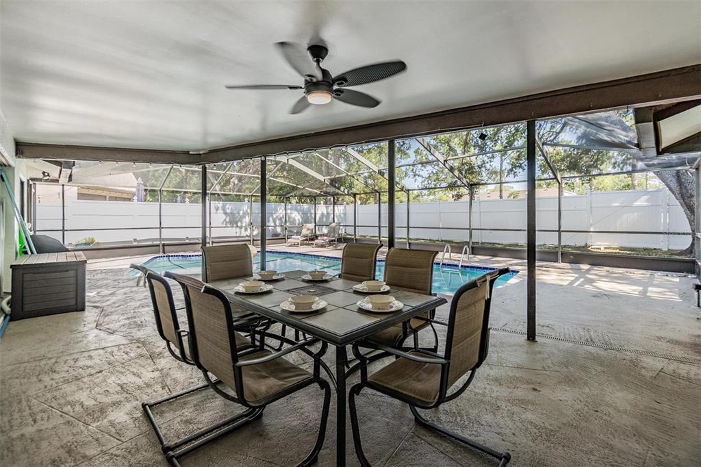 1 Fernery Lane Safety Harbor, FL 34695 - Photo 11 of 44 a view of a dining room with furniture window and outside view