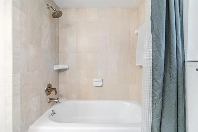 a bathroom with a bathtub