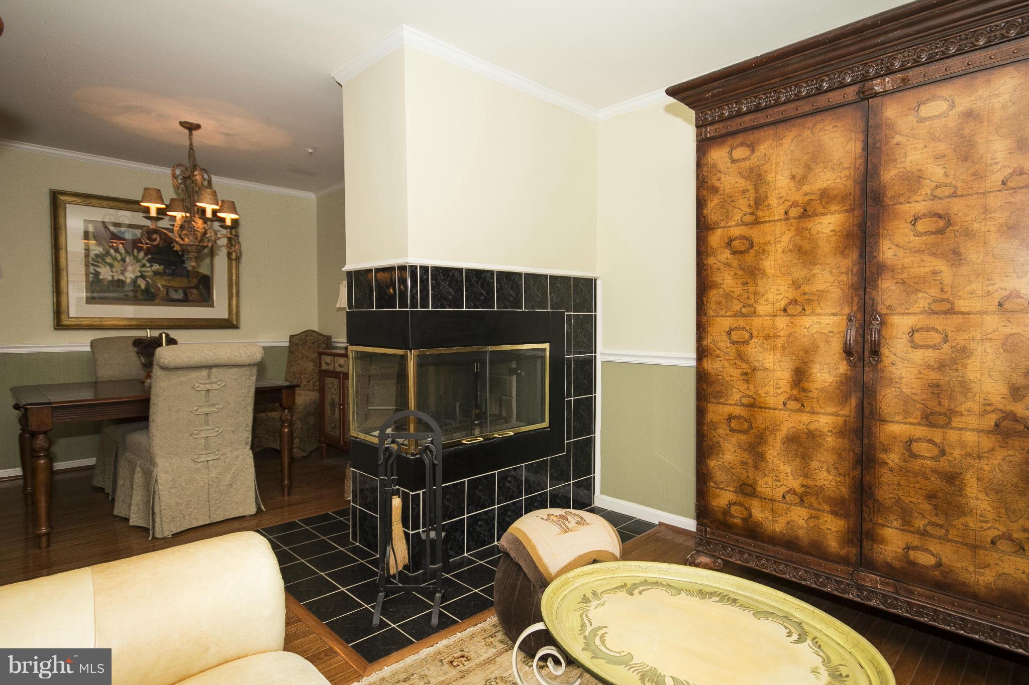 5243 Downing Road Baltimore, MD 21212 - Photo 10 of 30 Living Room/Dining Room with Center Fireplace