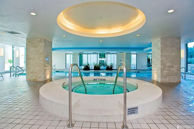 a patio with table and chairs