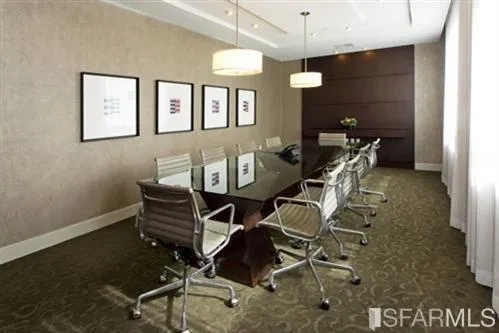 a view of a workspace with furniture