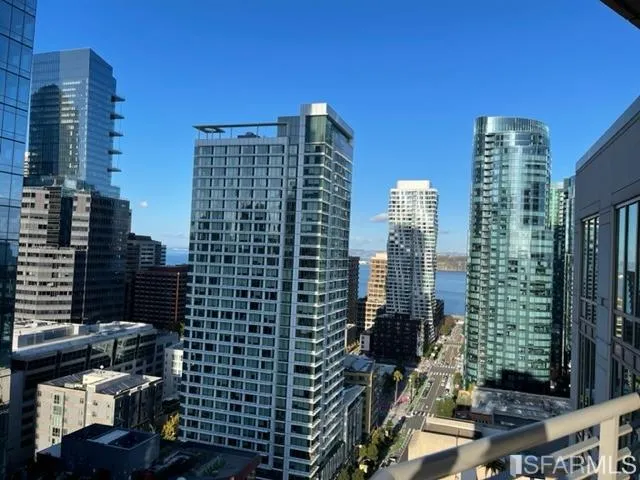a view of a city with tall buildings