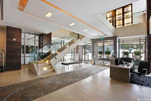a view of entryway and hall with dining area